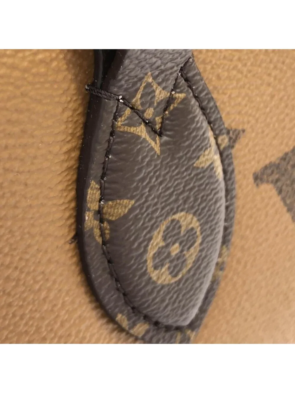 Louis Vuitton Monogram Reverse On The Go East West Chain